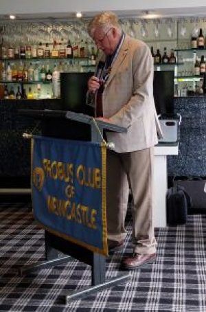 8. Member Arthur Coleman & President cutting cake_resized